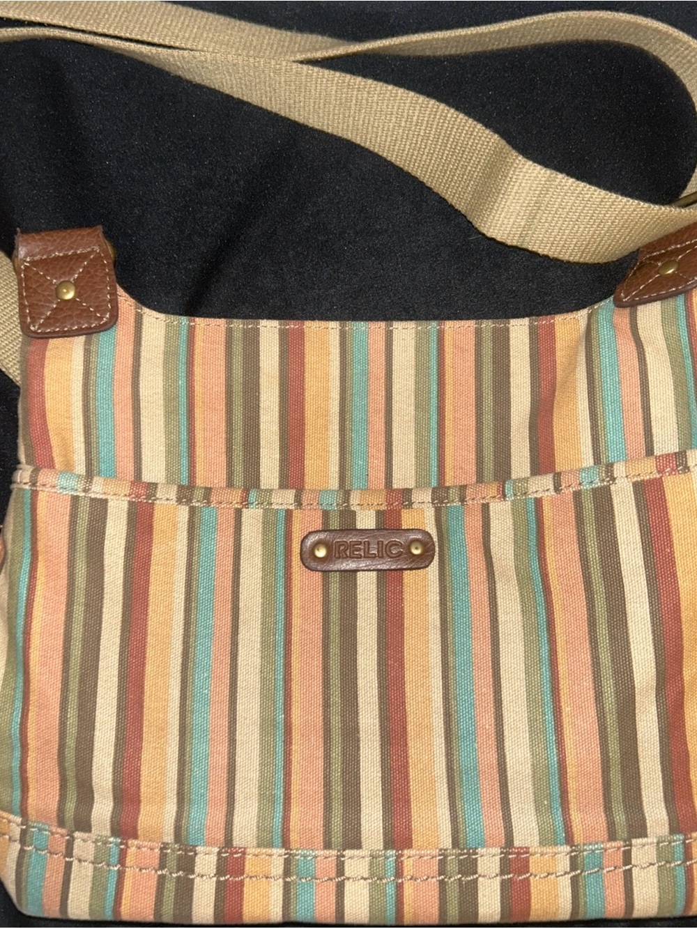 Relic Messenger canvas crossbody Bag In A Beautiful Striped Pattern.